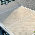 Flat bed for 60in CA dual rear wheel cab installed on a work truck