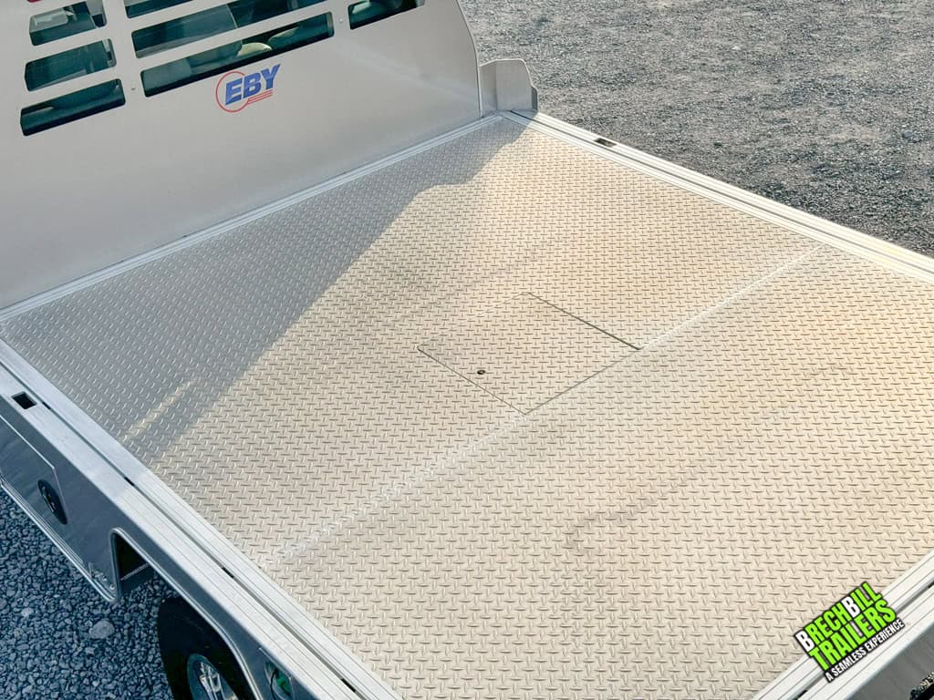 Flat bed for 60in CA dual rear wheel cab installed on a work truck