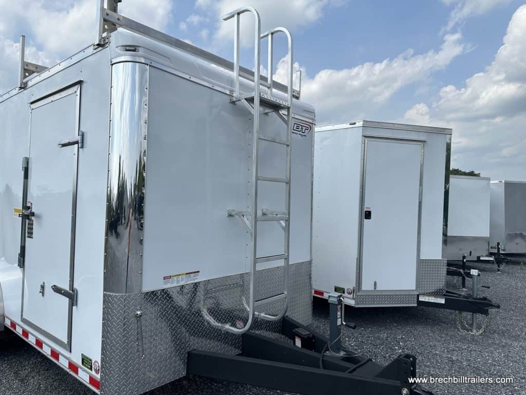 A few Bravo 10K Tradesmen Enclosed Contractor Cargo Trailers for sale in the lot.