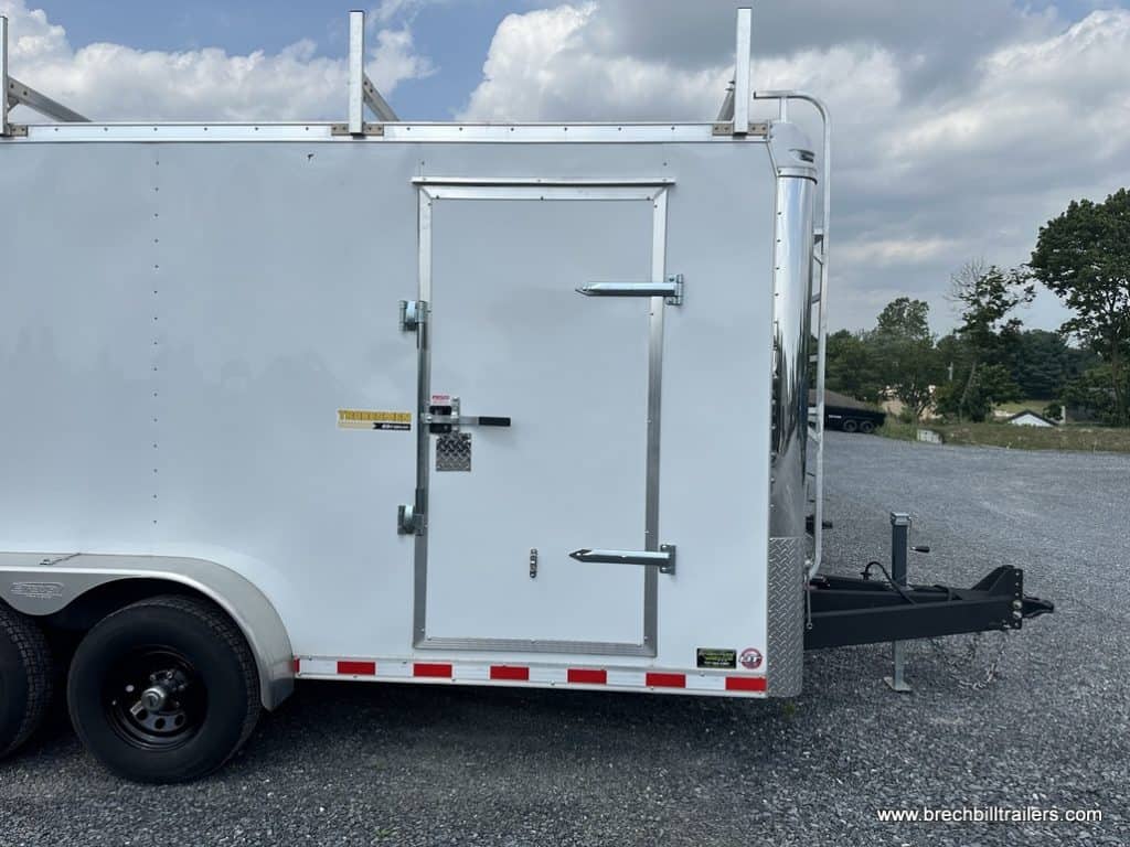 Side view with side door on the Bravo 10K Tradesmen Enclosed Contractor Cargo Trailer