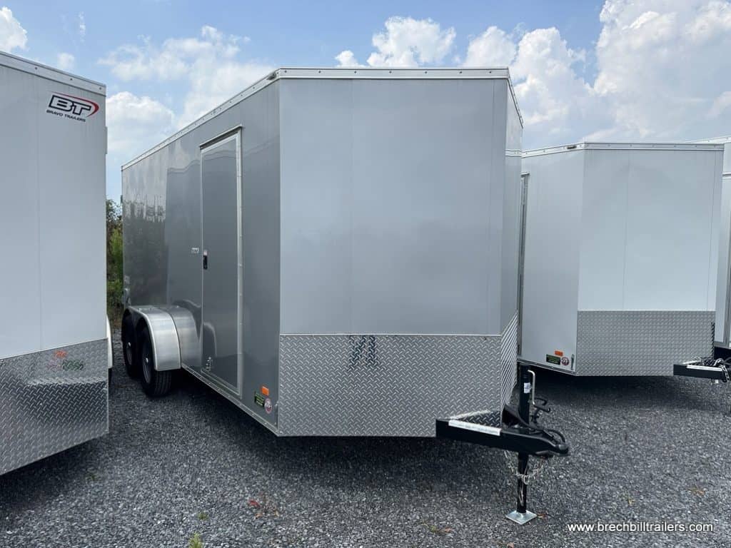 A silver Bravo Scout 7K Enclosed Cargo Trailer