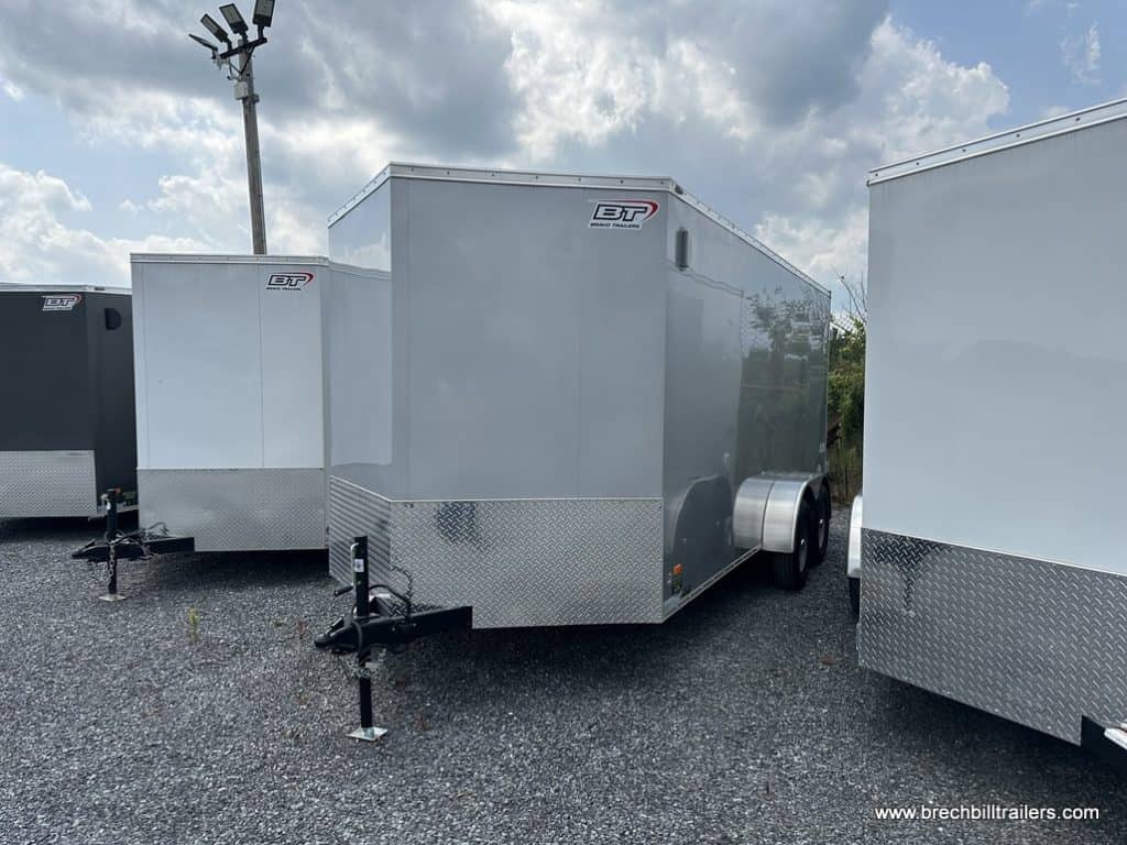 A few Bravo Scout 7K Enclosed Cargo Trailers for sale at the dealership.