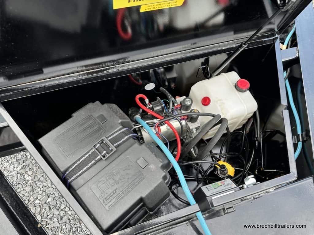 Big Tex 14K Roll Off Bumper Pull Dump Trailer fluid reservoir and hydraulic controls