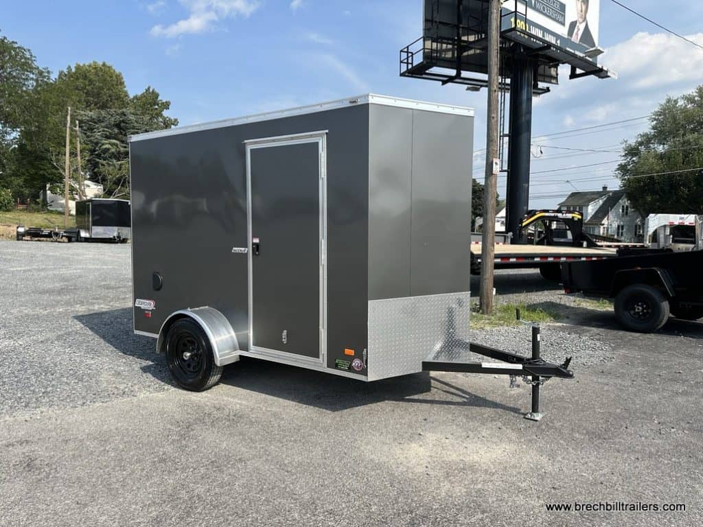The trailer parked outside in the lot for sale.