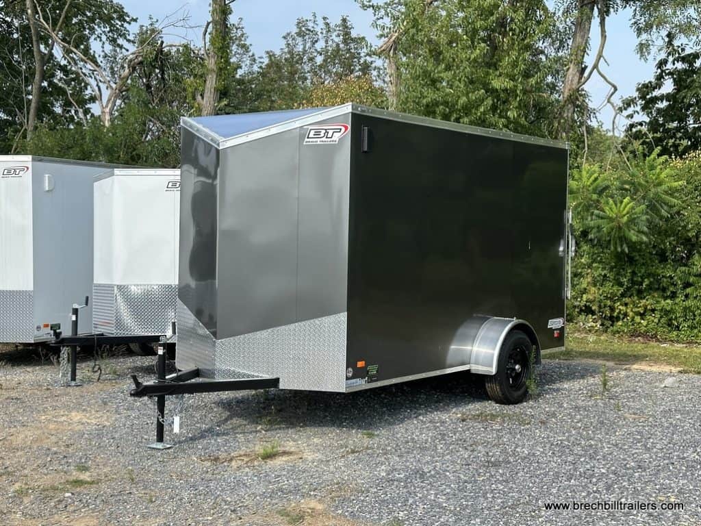 Bravo Scout 3K Enclosed Cargo Trailer parked in the lot.