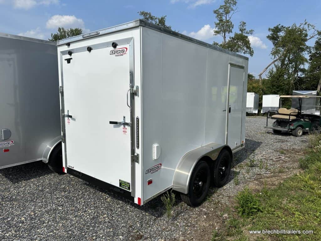 The back view of a new Bravo Scout 7K Enclosed Cargo Trailer