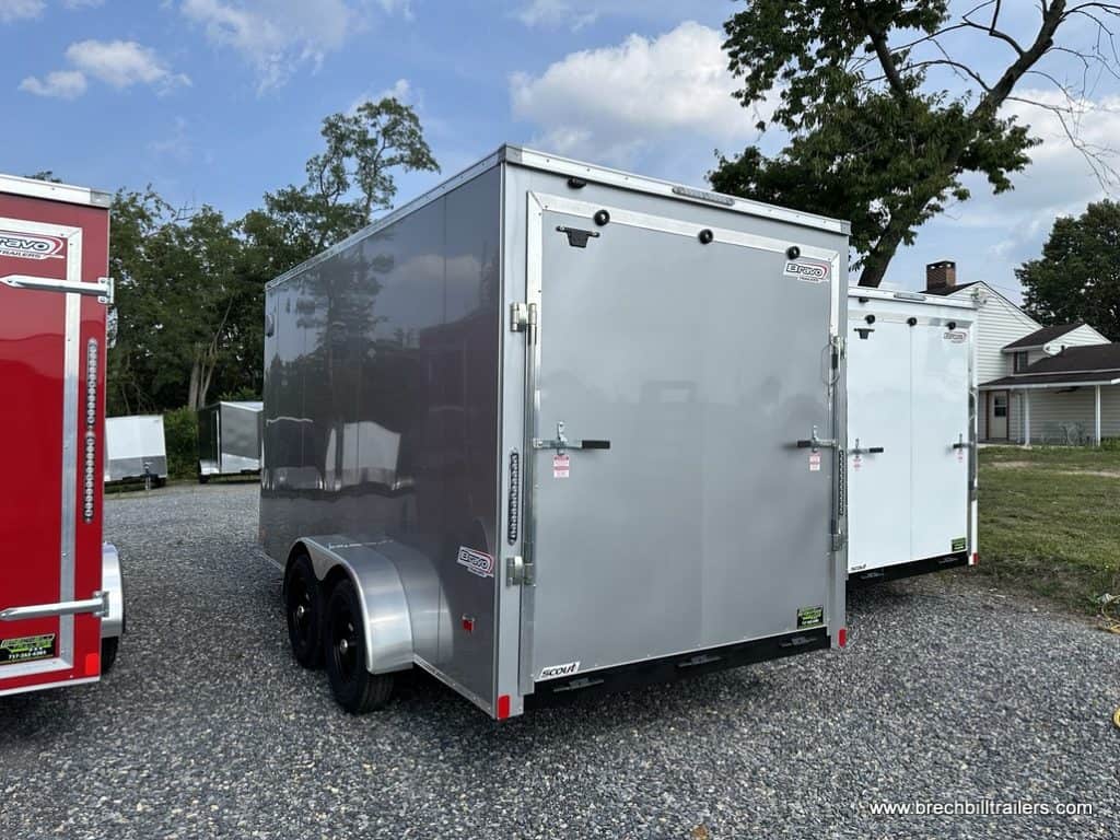 A silver Bravo Scout 7K Enclosed Cargo Trailer