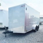 A white 7x14 Bravo Scout 7K Enclosed Cargo Trailer