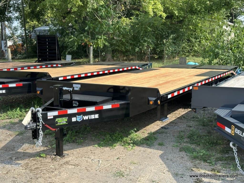 A brand new parked Bwise EDB 15.4K Deck Over Equipment Trailer