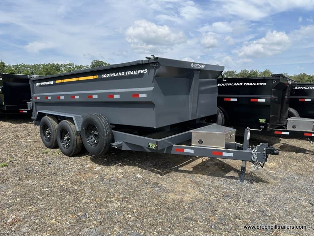 Side view of a charcoal Southland 15K Tandem Axle High Side Dump Trailer