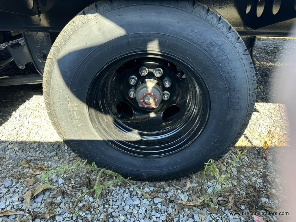 Black wheels on the trailer.