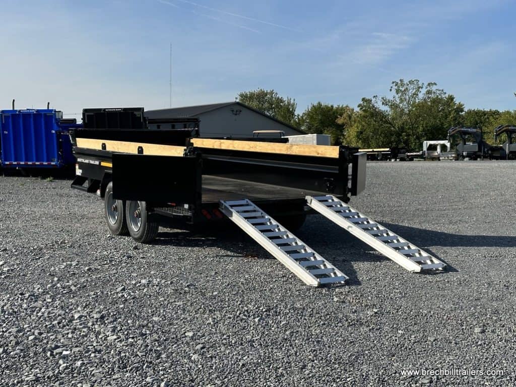 Southland 22K Tandem Axle Dump Trailer with ramps down.
