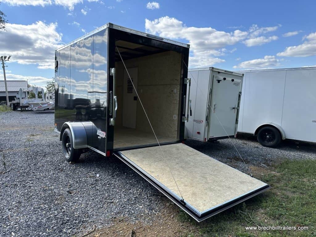 A black Bravo 3K Scout Enclosed Cargo Trailer
