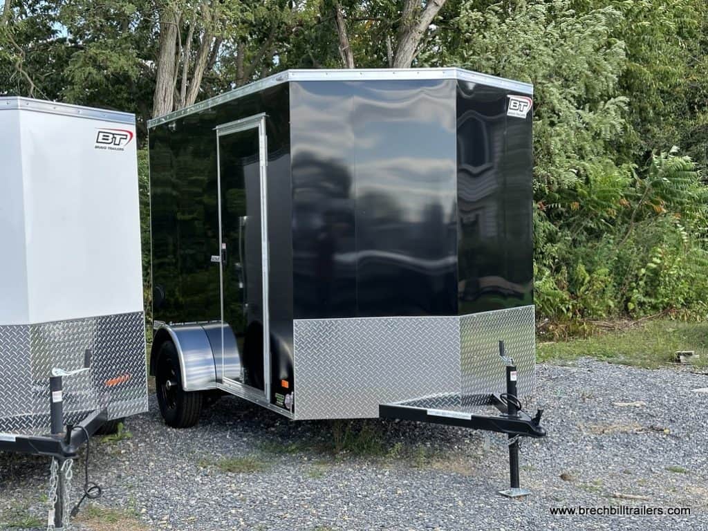 A parked Bravo 3K Scout Enclosed Cargo Trailer for sale.