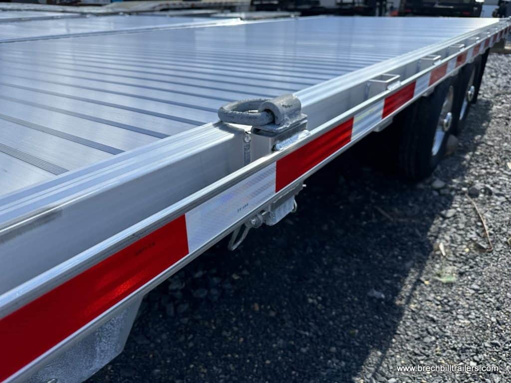 Side of a EBY 14K Deck-Over Equipment Trailer