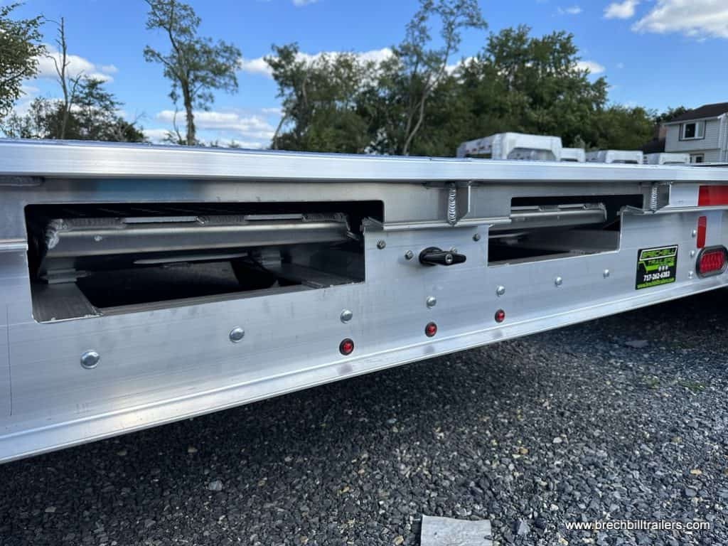 Back of trailer where the ramps slide out.