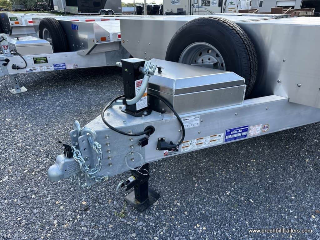 Trailer detached and held up by its jack.