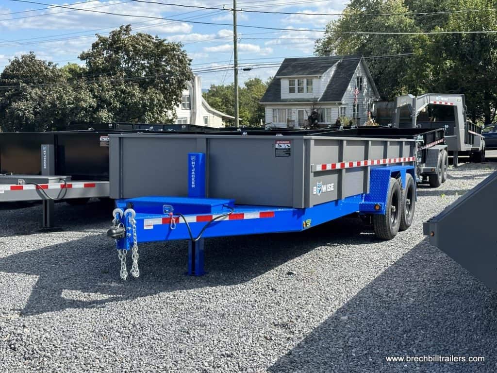 A Bwise DLP 15K Heavy Duty Dump Trailer parked in the yard.