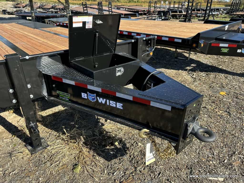 Front of trailer with pintle ring and tool box.