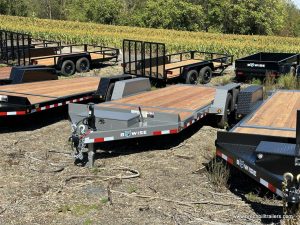 Bwise 15K Gravity Tilt Deck Trailer parked in the lot