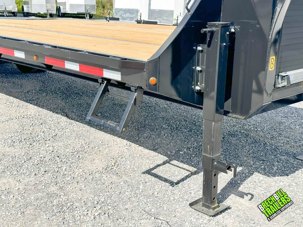 Belmont 8.5x30 Heavy Duty Gooseneck Trailer being held up by front jacks.