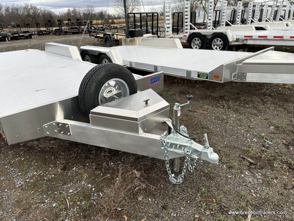 A parked EBY car hauler with a spare wheel mounted.