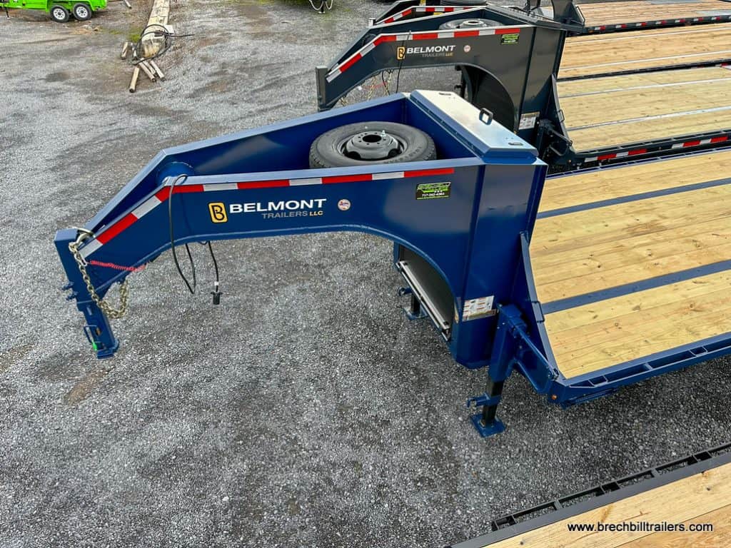 Gooseneck with spare tire mounted on top.