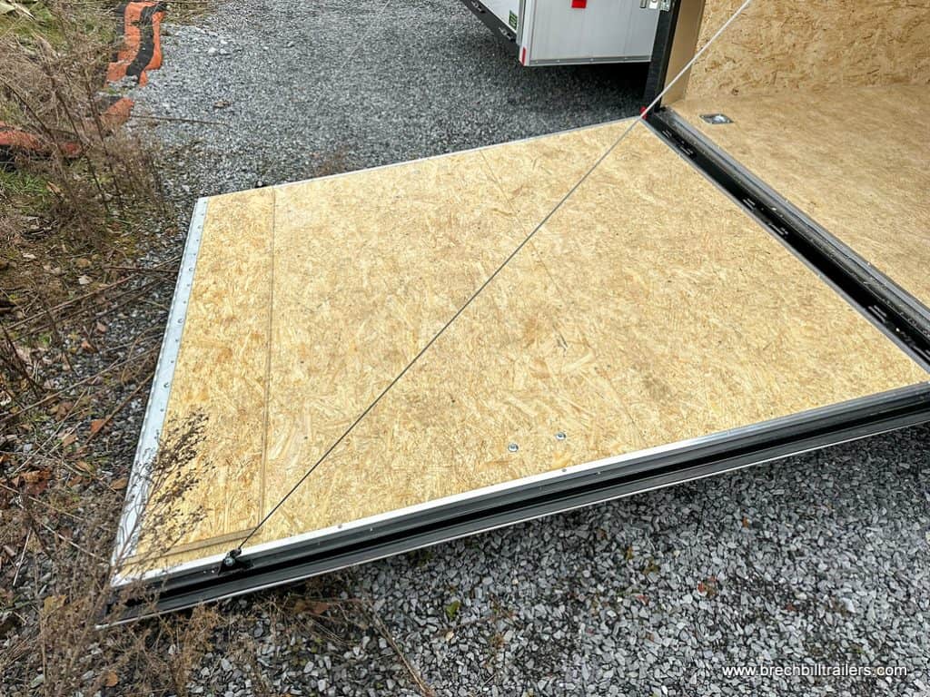 Ramp door down on the trailer.