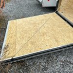 Ramp door down on the trailer.