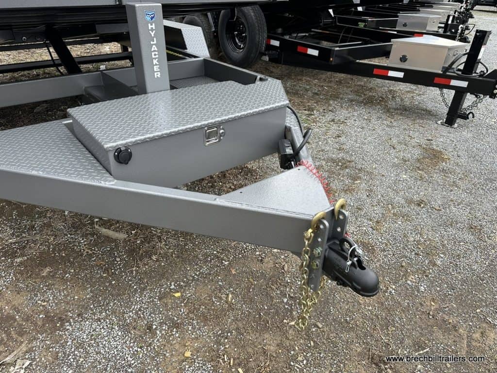 Trailer coupler with chains for hooking up to a truck.