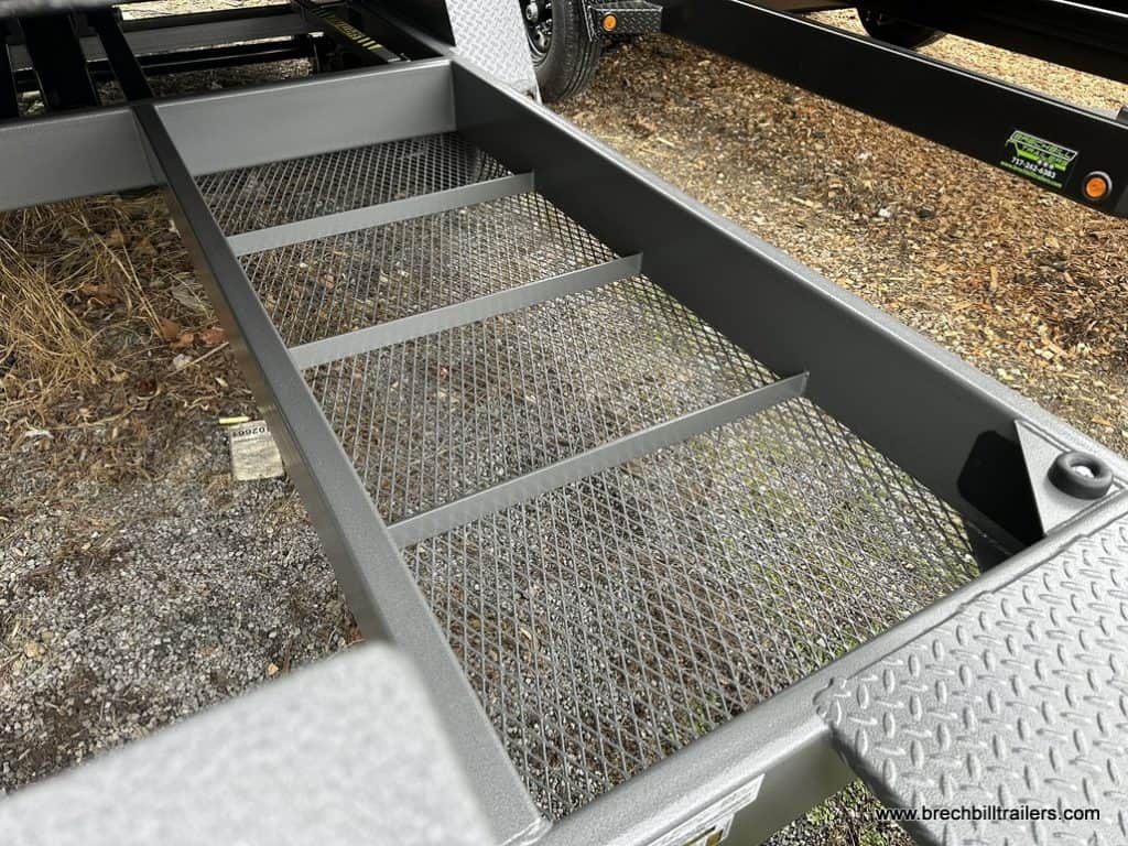 The gray trailer frame.