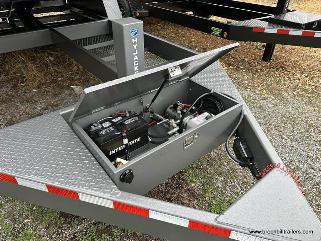 Bwise DLP 15.4K Heavy Duty Dump Trailer's battery box open.