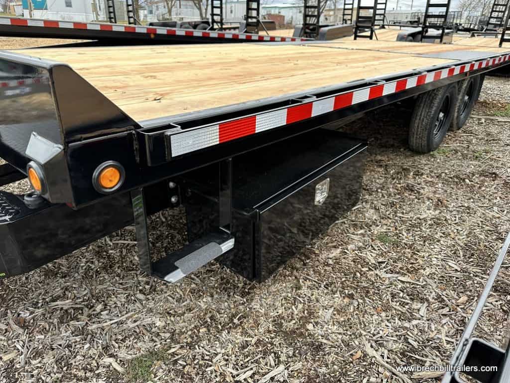 Shiny black storage box on the Bwise Hydraulic 15.4K Tilt-Deck Trailer