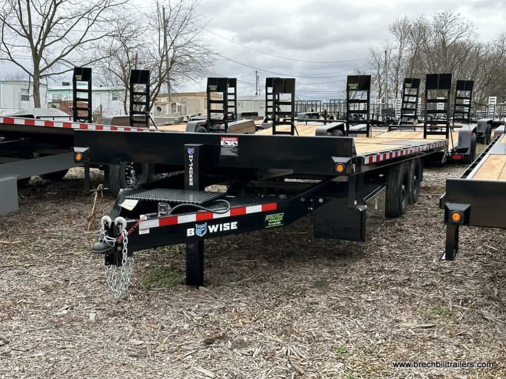A parked Bwise Hydraulic 15.4K Tilt-Deck Trailer