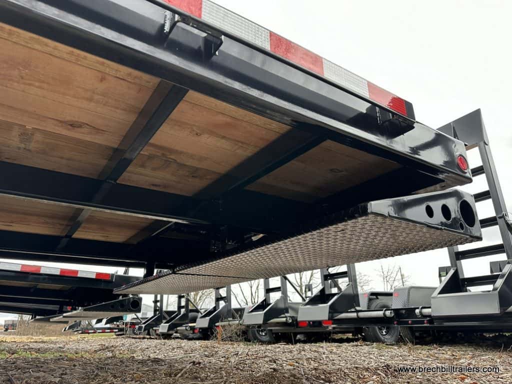Ramps folded down on the Bwise tilt deck trailer.