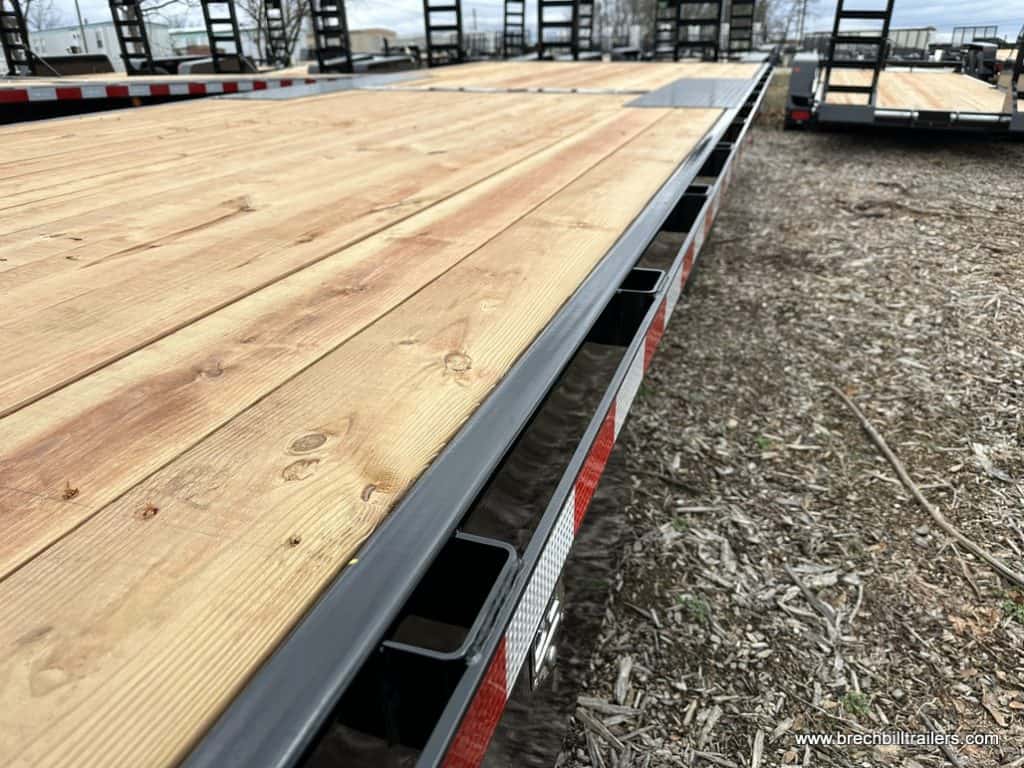 The deck on the Bwise 15.4K Hydraulic Tilt-Deck Trailer