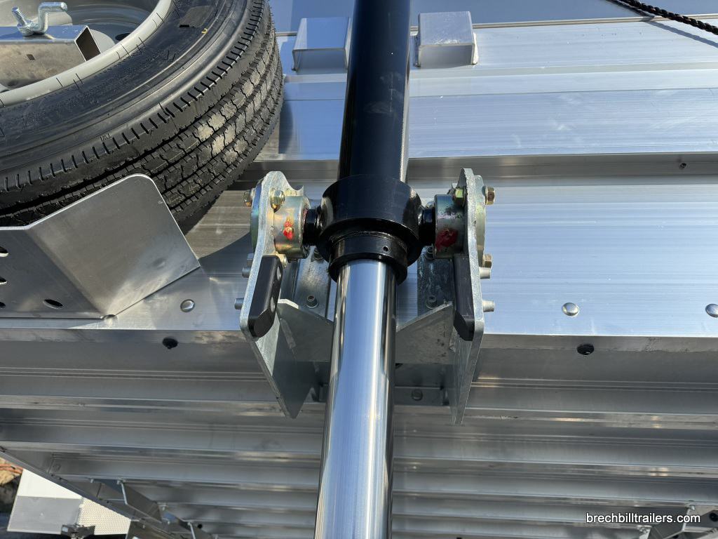 Cylinder closeup with spare tire in sight.