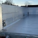 Inside the dump trailer bed