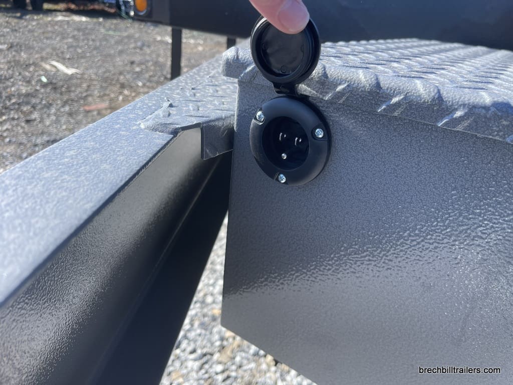 Close up of power connection on the Bwise 15.4K Hydraulic Tilt-Deck Trailer