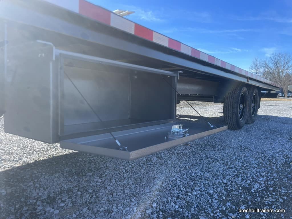 Open toolbox on the side of the trailer.