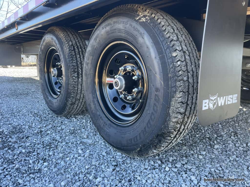 Black wheels on the 24ft Bwise tilt deck trailer.