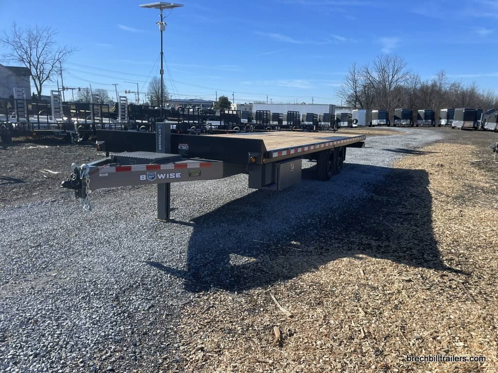 The Bwise 15.4K Hydraulic Tilt-Deck Trailer 102″x24’ parked at the lot.