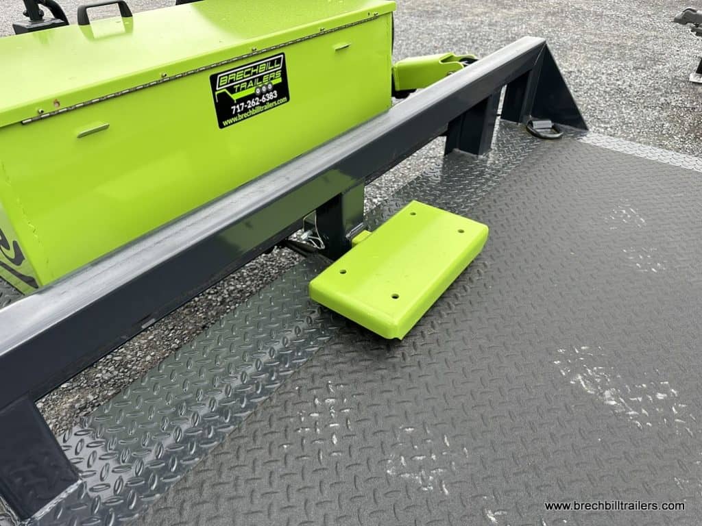 Green storage box on the trailer.