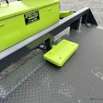 Green storage box on the trailer.