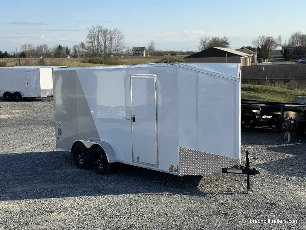 A parked Bravo Scout 7K Enclosed Cargo Box Trailer