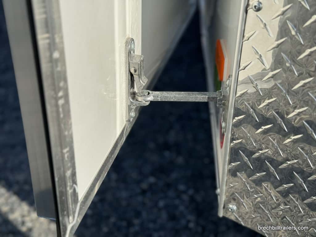 Door being held open on the Bravo Scout 7K Enclosed Cargo Box Trailer