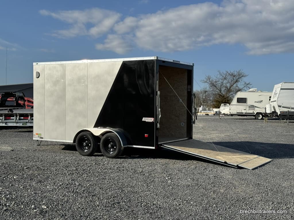 Silver and black Bravo 7K Scout Enclosed Construction Trailer with door down