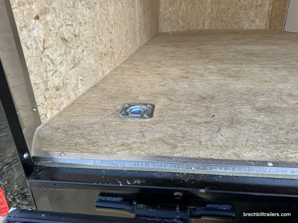 Recessed d ring on the floor of the trailer.