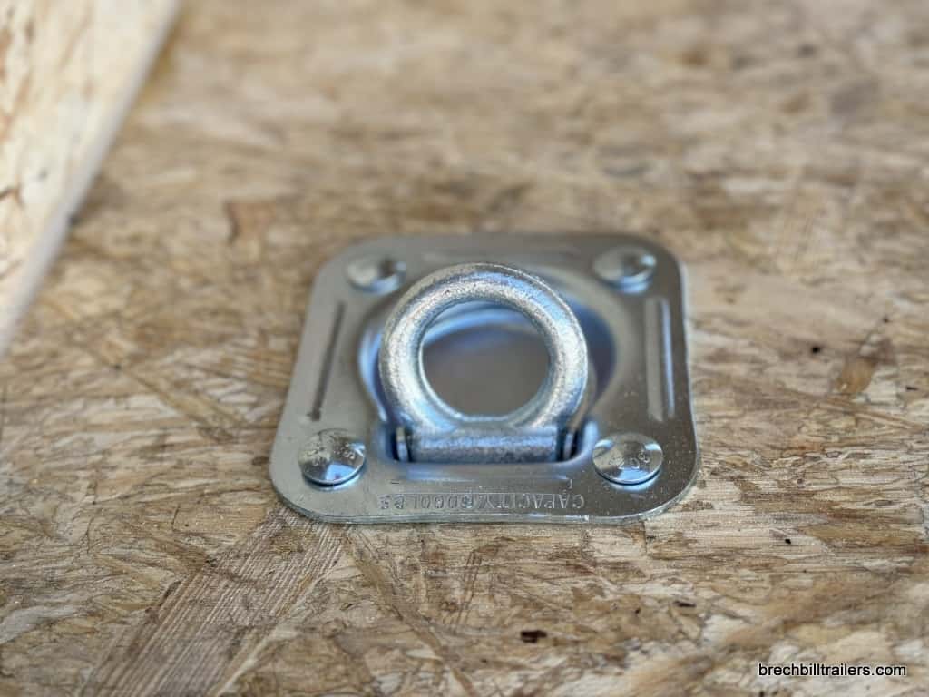 A recessed d ring inside trailer for securing cargo.