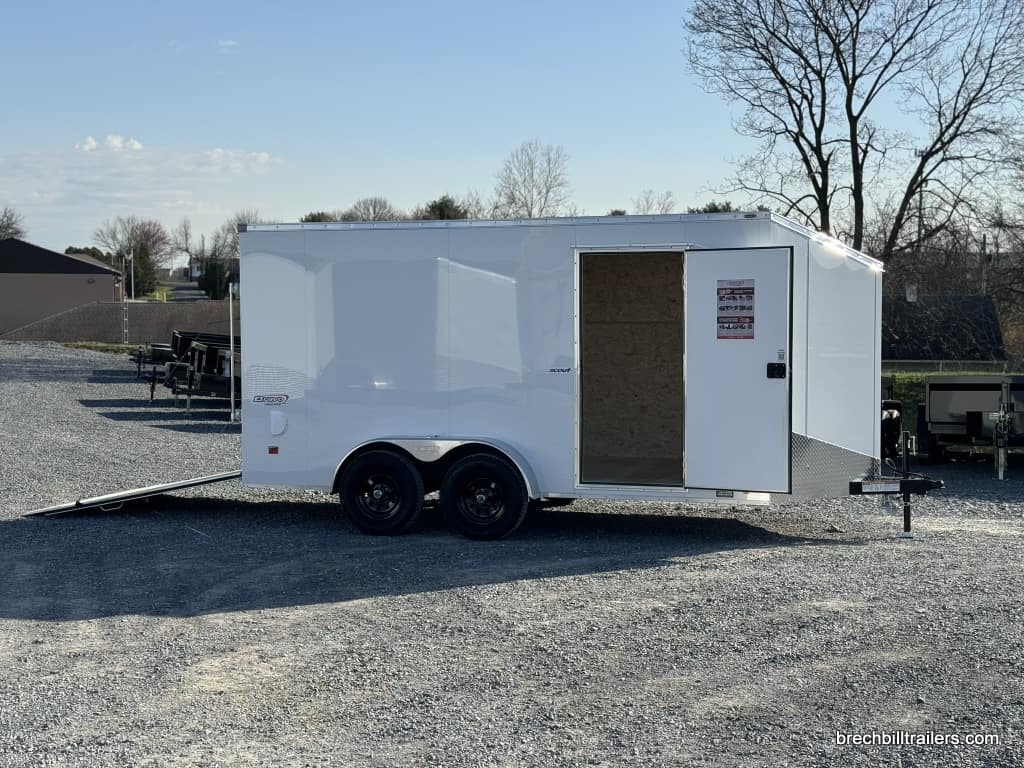 A new, all white Bravo 7K Scout Enclosed Cargo Trailer